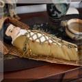 C12. Composite papoose doll with cradleboard. 
